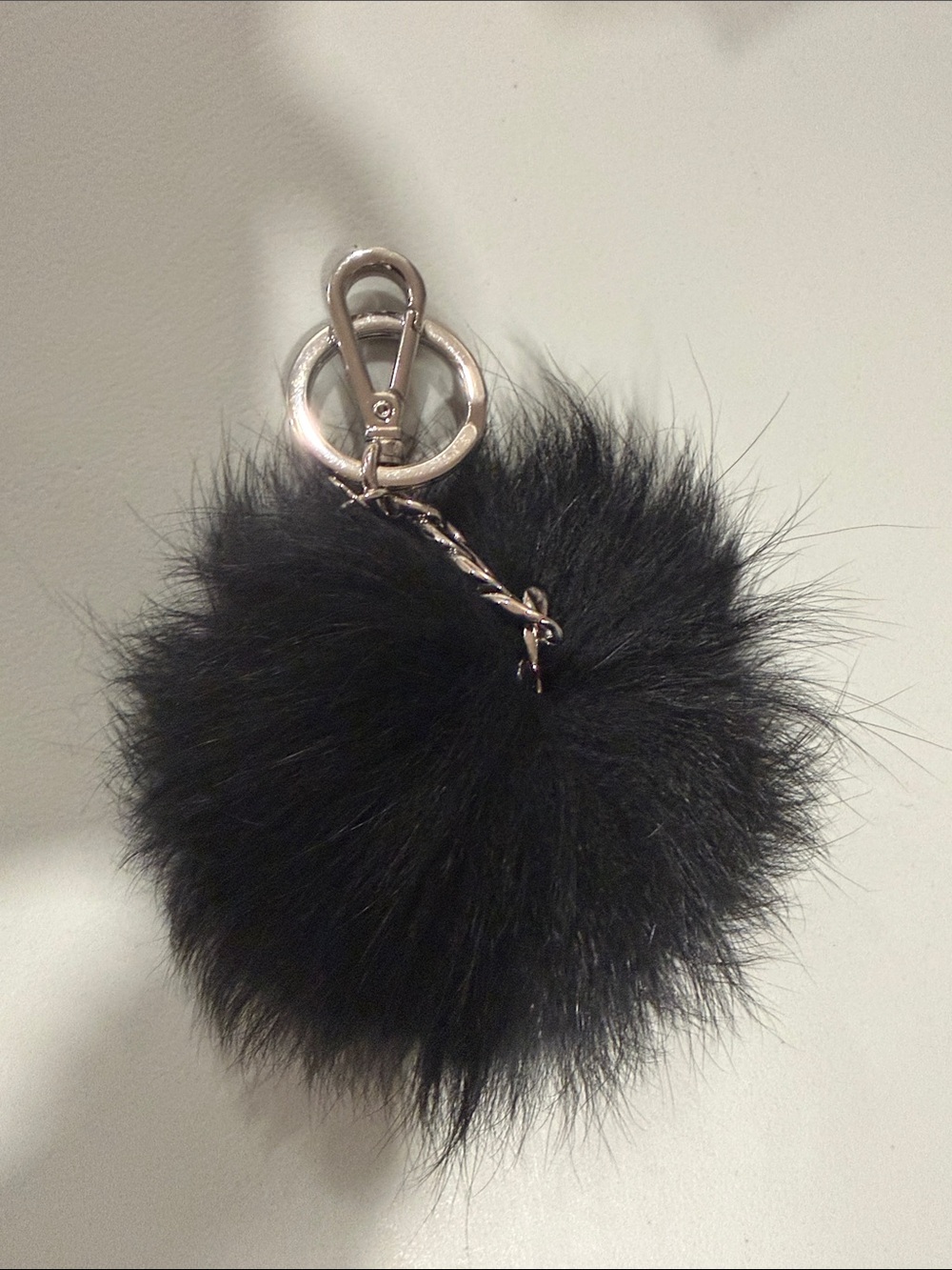 Black Michael Kors Fur Pom Keychain with Silver Hardware